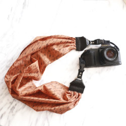 arrow orange scarf camera strap