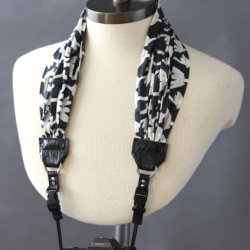windy black and white scarf camera strap