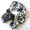 Windy black and white scarf camera strap